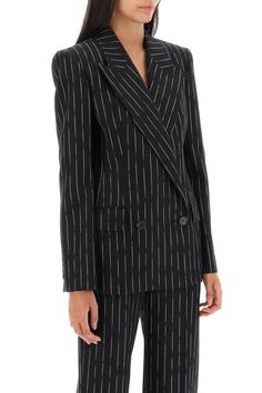 This jacket has a unique broken pinstripe pattern that adds a touch of flair to its elegant, tailored silhouette. Crafted from luxurious wool twill, its structured shoulders and wide peak lapels give it a sophisticated edge. Perfect for those who appreciate timeless style with a modern twist. Waisted silhouette with structured shoulders Double-breasted two-button closure Wide peak lapels and central back vent Two side flap pockets and a chest pocket Full lining for added comfort Made in Italy Co Pinstripe Jacket, Black Alexander Mcqueen, Twill Jacket, Striped Blazer, Double Breasted Blazer, Emilio Pucci, Wool Blazer, Black Blazers, Jacket Sale