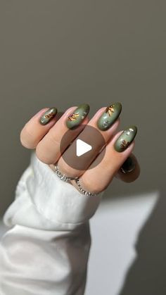 Aistė Haas on Instagram: "🛻🌲🍂 channeling the mystique of the season with these green aura nails and chrome fall leaves 🌧️

Using: @gelcare.official  Detox Green | Herbal 
For 15% off use code: AISTE

*3D gel and pigments are linked on my amzn in the bio 
_____
*affiliate #fallnails #chromenails #auranails #greennails #nails #nailinspo #nailtutorials #diynails 3D nail art flower fall foliage nails aura ombre gradient, almond nails, simple classy"