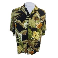 Hawaiian Palms Men ALOHA shirt pit 2 pit 22 sz L camp rayon floral tropical luau Shirt features tropical flowers and foliage, dramatic color contrasts. RUNS SMALLER THAN MANY LARGE SIZES Rayon Nice preowned with no rips tears holes stains or missing buttons. All measurements are approximate. - see pics Fabric:rayon Color:black, green, brown, orange, white and more Collar: Spread Pocket:Single, left Buttons:plastic Back Pleats:knife Stock Location:S13 Black Camp Shirt With Tropical Print, Black Tropical Hawaiian Shirt With Camp Collar, Black Hawaiian Shirt With Tropical Print, Black Tropical Camp Shirt, Black Hawaiian Camp Shirt With Tropical Print, Black Tropical Shirt With Tropical Print, Green Collared Hawaiian Shirt With Floral Print, Black Tropical Print Shirt, Hawaiian Camp Shirt With Hibiscus Print