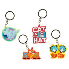 three different key chains with cartoon characters on them, one has a cat in the hat