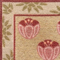 an area rug with flowers and leaves on it