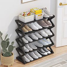 there is a shoe rack with many pairs of shoes on it