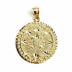 (100% AUTHENTIC) 14k yellow gold Aztec Mayan sun calendar pendant charm. "Comes with a gift box" 14K yellow Solid Gold pendant charm. Solid 14K gold, not plated. Nicely polished and shiny. Stamped 14K for Authenticity. ADDITIONAL INFO: REAL 14K Yellow Gold. Polished, Shiny  5 grams. 1 inch diameter Please refer to the photo of the item next to a quarter for comparison purposes. Please ask me any questions you may have before you make a purchase.Shipping: Your order will be professionally packed Mayan Gold Jewelry, Sun Gold Pendant For Men, Sun Calendar, Mayan Sun, Yellow Gold Zodiac Amulet Necklace, Aztec Gold Coin, Yellow Gold Zodiac Sign Pendant Jewelry, Cute Engagement Rings, Gift Jewelry