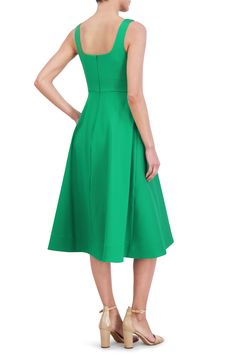 An off-center hemline adds to the fun of this verdant cocktail dress designed with a romantically squared neckline and a pair of handy pockets. 34" - 47" length (size 8) Hidden back-zip closure Square neck Side-seam pockets Lined 97% polyester, 3% spandex Dry clean Imported Green Midi Dress With Pleated Bodice For Evening, Summer A-line Midi Dress With Flattering Cut, Elegant Green Midi Dress With Pleated Bodice, Evening Green Midi Dress With Straight Neckline, Elegant Green Dress With Straight Neckline, Green Midi Dress With Straight Neckline For Evening, Green Straight Neckline Midi Dress For Evening, Green A-line Midi Dress, Green Knee-length Midi Dress For Evening