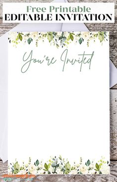 the free printable editable wedding card is shown with flowers and leaves on it