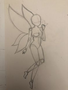 a pencil drawing of a fairy with wings