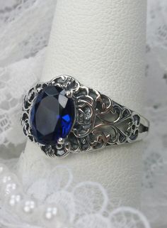 2ct Simulated Blue Sapphire Solid Sterling Silver Victorian/ Art Nouveau Filigree Ring {Made To Order} Design #14 https://etsy.me/2XCiwlF #jewelry #ring #sterling #silver #yes #girls #blue #sapphire #oval Engraved Oval Filigree Ring For Promise, Engraved Oval Filigree Promise Ring, Classic Oval Filigree Ring Stamped 925, Classic Oval Sterling Silver Filigree Ring, Engraved Filigree Oval Promise Ring, Elegant Oval Sapphire Ring Stamped 925, Ornate Oval Filigree Ring Stamped 925, Heirloom Oval Sapphire Ring With Intricate Design, Ornate Oval Filigree Promise Ring