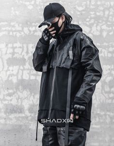 Design: Techwear, Ninja Techwear, Cyberpunk, Military, Futuristic Ultra-resistant Techwear Jacket: Made with premium materials that are resistant, flexible and lightweight to preserve your mobility while protecting you from rain and wind. Technical clothing: This techwear jacket is equipped with a multitude of storage pockets to easily carry your personal belongings. Breathable materials: This techwear jacket made of leatherette can be worn all year round. Suitable for men and women Hand washabl Black Futuristic Outerwear For Urban Adventures, Futuristic Black Outerwear For Urban Adventures, Black Cyberpunk Outerwear With Detachable Hood, Black Techwear Outerwear For Cosplay, Black Futuristic Windbreaker For Fall, Futuristic Black Windbreaker For Fall, Techwear Long Sleeve Parka For Urban Adventures, Techwear Long Sleeve Outerwear For Cosplay, Black Utility Jacket With Adjustable Hood For Streetwear