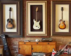 a living room with guitars on the wall and music memorabilia in front of it that reads, no music no life know music know life