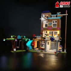 a lego light up house with some lights on