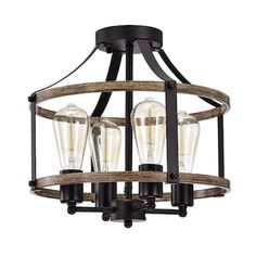 three light chandelier with wood accents and metal cage around the bottom, on an isolated white background