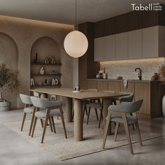 a dining room table and chairs in front of a counter