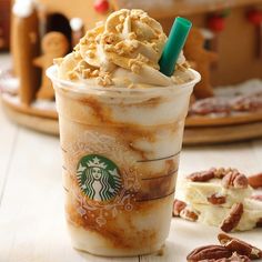 a starbucks drink with whipped cream and pecans