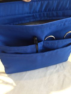 "This belted Scrub Pocket is super lightweight, and will accommodate tools, instruments, phone, notepad, keys, money, credit cards, etc. Dimensions are 8\" X 8\" with three layers of pockets for storing your personal or professional items. Belt and buckle are included. Machine wash, dry flat. Thanks for stopping by!" Blue Zipper Closure Organizers For Everyday Use, Blue Zipper Pouch Organizers For Everyday Use, Bridal Attendant, Belt Storage, Bag With Pockets, Medical Instruments, Utility Belt, Purse Accessories, Three Layer