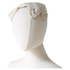 This truly intricate 1940's hat, rendered in a cream plastic braid, which has been folded and pleated in an intricate coral like design, is a rare piece to behold. The rounded crown of the hat, showcases pointed and scalloped edges, built on a wire base frame. We recommend the use of a hat pin to add in the stability whilst wearing this piece. Label: None Measurements Width from Front to Back: 6 inches Width from Side to Side: 11.5 inches Size: One size fits all Material: Plastic braiding, wire 1940's Hat, 1970s Shoes, Floral High Heels, Cream Hat, 1940s Hats, Silk Headband, Color Crema, Spiral Design, Hat Pin