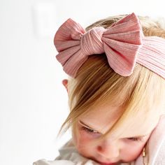 These pretty bow headbands have a snuggly soft rib texture with hints of glittery accents. Comes in a variety of colors. Trendy, stylish and comfortable on your little one's head. Minimal Baby, Headband Bows, Trendy Headbands, Bow Headbands, Newborn Headband, Soft Headbands, Newborn Headbands, White Bow, Modern Baby