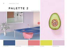 an avocado hanging on the wall next to a ping pong table in a pink room