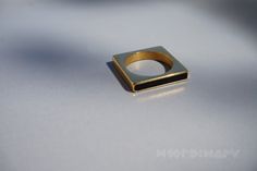 ♥ Fine minimalist "Square" ring, basic geometric shape ensures originality and pure beauty of this architectural design * black artificial stone *  waterproof * portable art object, a treasure that will stand the test of time with grace and style. * Created in high quality stainless steel and 18k gold plated * Suitable for a variety of occasions, from casual outings to more formal events, this ring is a versatile addition to any jewelry collection. * Dimensions: width 23mm x 23mm Size 53 / 17.3 Modern Square Cut Signet Ring As Gift, Contemporary Square Jewelry For Gifts, Modern Square Gold Rings, Minimalist Geometric Rings For Gifts, Minimalist Square Signet Ring Gift, Artificial Stone, Square Ring, Geometric Ring, Square Rings