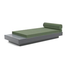 a single bed with green sheets on it and a grey base for the headboard