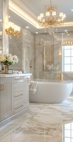 a bathroom with a tub, sink and chandelier in the middle of it