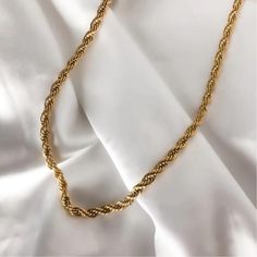 18k Gold Rope chain necklace Thick gold chain necklace Unisex chain necklace ꕥ 𝗢𝗨𝗥 𝗝𝗘𝗪𝗘𝗟𝗥𝗬 𝗜𝗦 ꕥ * High Quality * Handmade * Waterproof  * 100% Lead & Nickel Free  * Won't tarnish or discolour * Hypoallergenic * Recyclable ꕥ 𝗠𝗔𝗧𝗘𝗥𝗜𝗔𝗟𝗦 ��ꕥ * 18K Gold Plated PVD Stainless Steel * 5mm Rope Chain ꕥ 𝗣𝗔𝗖𝗞𝗔𝗚𝗜𝗡𝗚 ꕥ * Every piece comes in their own bag * 100% Recyclable Packaging ♺ ꕥ 𝗢𝗥𝗗𝗘𝗥 𝗧𝗜𝗠𝗘𝗦 ꕥ * Orders are shipped out within 1 Day ꕥ 𝗦𝗛𝗜𝗣𝗣𝗜𝗡𝗚 ꕥ 𝑼𝑺𝑨 🇺🇸 * Thick Gold Chain Necklace, Gold Rope Necklace, Thick Gold Chain, Layering Necklaces, 18k Gold Chain, Herringbone Necklace, Gold Rope Chains, Necklaces Gold, Jewelry Card