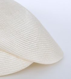 "\"Lou\" is a light cap with a sophisticated lateral fold and a small shield. The slider cap made of the unbleached straw of the Agave is pleasantly air-permeable and very light. The woven type Parasisol results in a fine \"herringbone\" pattern. A hat band sewn in by hand with an invisible stitch ensures a perfect fit and a noble look. I manufacture the cap in the colour \"nature\". The peaked cap can be combined to elegant and sporty outfits. The design is timelessly beautiful, equally perfect Elegant White Woven Sun Hat, Elegant White Woven Straw Hat, Elegant Cream Straw Hat, Cream Woven Panama Hat In Toquilla Straw, Elegant Cream Toquilla Straw Hat, Adjustable Beige Sinamay Straw Hat, Beige Straw Cap Hat, Elegant Cream Woven Straw Hat, Elegant White Woven Hat