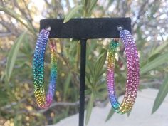 Fun fashion rhinestone hoops! These fun and stylish rhinestone multi color crystal earrings are a great accent piece! Pageant, prom, or bridal! Size of earrings: 2 inches long colors available: Multi color rhinestones looking for a bracelet to complete your look? check out this matching bracelet! :) https://www.etsy.com/listing/702336861/multi-color-bracelet-fuchsia-multi-color?ref=shop_home_active_109&pro=1&frs=1 https://www.etsy.com/listing/702336499/multi-color-bracelet-multi-color-cu Pink Crystal Bracelet, Prom Necklaces, Matching Bracelet, Beaded Hoop Earrings, Beaded Hoops, Fun Fashion, Large Crystals, Gorgeous Jewelry, Colorful Bracelets