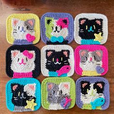 nine crocheted coasters with cats on them