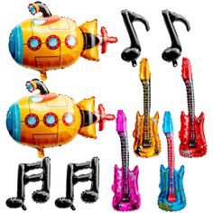 an assortment of inflatable toys including a toy guitar and other musical instruments are shown