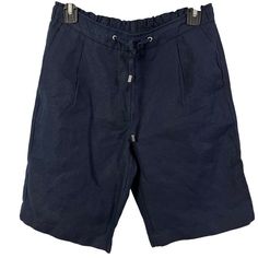 Waist: 27-32 Hip: 36 Rise: 9.5 Inseam: 9 Elevate Your Summer Wardrobe With These Chico's Women's Tie Front Shorts In Navy Blue. The Pleated Design And Slash Pockets Add A Touch Of Practicality To The Stylish Bermuda Shorts. Perfect For Casual Or Travel Occasions, The Shorts Feature A Tie Closure And Are Made Of 100% Linen Fabric, Ensuring Comfort And Durability. The Shorts Come In A Size 000/0 And Have A Mid-Rise Waist Size Of 27-32 Inches. They Are Machine Washable And Have A Dark Fabric Wash. Dark Fabric, Women's Tie, Womens Tie, Summer Wardrobe, Waist Size, Bermuda Shorts, Linen Fabric, Mid Rise, Blue Color