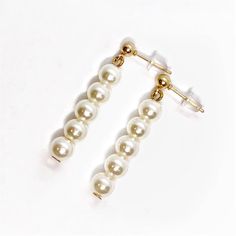 Material: Gold plating over alloy Stone: Pearl bead Size: 34mm Come with a gift box Reg: $29.99 Elegant Alloy Earrings As Gift, Elegant Alloy Earrings For Gift, Elegant Pearl Earrings Made Of Alloy, Gold Alloy Jewelry With Pearl Charm, Classic Metal Jewelry With Pearl Drop, Silver Alloy Drop Pearl Earrings, White Alloy Drop Earrings, White Alloy Jewelry With Matching Earrings, Formal Alloy Drop Earrings