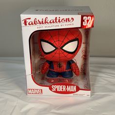 the spider - man bobble head is in its box