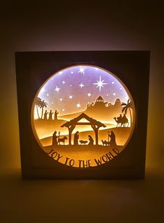 an illuminated nativity scene with the birth of jesus