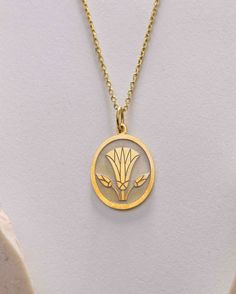 Gold Egyptian Lotus Pendant - Lotus Flower Gold Necklace ● Material of pendant: Solid Gold 14k ( REAL GOLD ) ● Metal Stamp: 14k ( REAL GOLD ) ● The pendant is available in 5sizes: - 12x17 mm / 0,47 x 0,66 inches - 13x18 mm / 0,51 x 0,70 inches  In the photos - 14x19 mm / 0,55 x 0,74 inches  - 16x21 mm / 0,62 x 0,82 inches  - 18x24 mm / 0,70 x 0,94 inches ( In the photos the size is 13x18 mm / 0,51 x 0,70 inches ) ( Jump Ring inner diameter: 4 mm ) ● Material of chain: Solid gold 14k ( REAL GOLD Yellow Gold Flower Charm Necklaces, Yellow Gold Flower-shaped Necklaces With Charms, Yellow Gold Flower Necklaces With Charms, Yellow Gold Flower-shaped Necklace With Charms, Gold Art Deco Necklace For Gift, Art Deco Engraved Necklace As Gift, Art Deco Hallmarked Necklace As Gift, Art Deco Hallmarked Necklace For Gift, Oval Necklace With Flower Charm For Gift