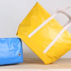 Made for sun, sand, shade, surf, and shore. These tote bags are your new outdoor go-to. The water resistant fabric allows water to roll right off and not be absorbed. Thick cotton handles to slip over your shoulder. Plastic chunky zippers that won't rust. Two holes in the bottom allow sand and any excess water to shake out. Interior hanging pocket. Size: 22” wide x 14” high x 8” bottom gusset Hunt Club, Bag Icon, Water Resistant Fabric, Pocket Size, Tote Bags, Surfing, Rust, Water Resistant, Handles