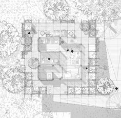 an aerial view of a house with lots of trees and plants on the floor plan