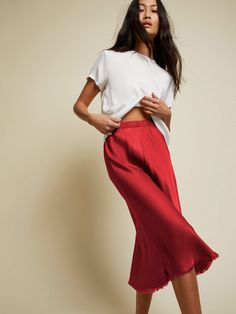 This luxe skirt with an elastic rib waistband and raw hem detail is cut on the bias, which means a perfectly slim fit that hugs all the right places. (This one comes in Crimson.) | Women's Mabel Skirt in Crimson | Ethical Essentials