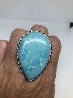 Large genuine aqua blue Larimar Vintage ring Low content silver not sterling. Size 9 Can be re sized at my jeweler. $10 All rings are shipped in a nice gift box. Check out our over a THOUSAND great reviews Engraving is $4 per letter and is not always perfect depending on the piece. It can take a few days if the jeweler is busy. This is payable to Paypal Judithsltd@gmail.com Blue Turquoise Ring With Large Stone For Anniversary, Blue Larimar Jewelry For Anniversary, Anniversary Blue Turquoise Ring With Large Stone, Unique Larimar Turquoise Ring As Gift, Silver Turquoise Larimar Ring For Anniversary, Silver Larimar Turquoise Ring For Anniversary, Anniversary Turquoise Larimar Ring In Silver, Anniversary Silver Turquoise Larimar Ring, Blue Hypoallergenic Rings For Anniversary