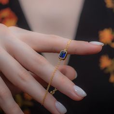 Introducing the exquisite Birthstone September Sapphire Bracelet, a stunning piece crafted from 14K solid gold, showcasing a beautiful rectangle design that elegantly frames the captivating sapphire gemstone. This bracelet is a perfect way to celebrate September birthdays or any special occasion, adding a touch of elegance to any outfit. Its timeless design makes it a versatile accessory that can be worn for both casual and formal events.  The vibrant blue hue of the sapphire represents wisdom a September Birthstone Necklace, September Sapphire, Rectangle Design, Sapphire Birthstone, Bracelet Christmas, Mom Wedding, Christmas Bracelet, Sapphire Bracelet, Vibrant Blue