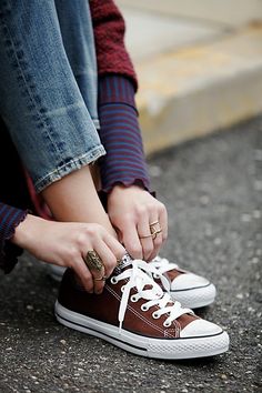 **Fit:** This style is in unisex sizing so a men's size 4 is a women's size 6.Classic canvas low-top sneakers from Converse. Brown Converse, Low Top Converse, Converse Low, Converse Low Tops, Brown Sneakers, Converse Sneakers, Crazy Shoes, Hummel Sneaker, Chuck Taylor Sneakers