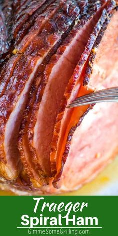 a close up of food on a plate with text overlay that reads tracer smoked ham