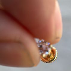 Men's and women's 1ct moissanite stud earrings. 1CT -5MM each stone (0.5ct each round stone). 14k gold vermeil over solid 925 sterling silver. Passes the thermal diamond test (test pen). Will show up as Moissanite on a lab analysis. Beautiful dazzling rainbow disco-ball effect. The moissanite shines so hard it will blind you. Stylish and secure screw back fasteners. Will never ever turn your skin or ears green. Buy with confidence with 30 day returns. 100% FREE SHIPPING in USA. Order now! Moissanite Earrings, Hip Hop Jewelry, Disco Ball, Solid 925 Sterling Silver, Gold Vermeil, Diamond Earrings, Screw, 925 Silver, Gold Plate