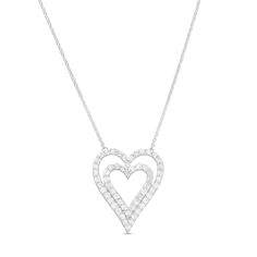 Double up on love and sparkle with this charming diamond heart-in-heart necklace. Fashioned in cool 10K white gold Smaller and larger heart outlines shimmer with diamonds in this layered design. The 1 ct. t.w. diamond design suspends centered along a cable chain. This 18.0-inch necklace secures with a spring clasp. White Diamond Open Heart Necklace, White Diamond Double Heart Necklace, White Double Heart Diamond Necklace, White Double Heart Diamond Accent Necklace, White Heart-shaped Diamond Necklace With Accents, White Heart-shaped Diamond Necklace For Anniversary, White Diamond Heart Necklace Fine Jewelry, White Diamond Heart Necklace In Fine Jewelry Style, White Heart Shaped Diamond Necklace In Fine Jewelry