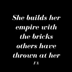 a black and white photo with the words, she build her empire with the bricks others have thrown at her