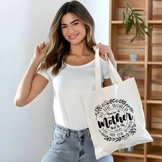 This 100% cotton bag comes in one size - 15" x 16"- perfect for everyday wear.  While the canvas material will show off your designs in great colors, it's durable and will last for years. The bag features 20" handles (made from the same canvas), making it easy to carry even with a week's worth of shopping. .: 100% cotton canvas .: Available in natural color .: Heavy fabric (12 oz/yd² (406.9 g/m .: Sewn-in label Canvas Making, Carryall Tote, Everyday Tote, Reusable Bags, Canvas Tote Bag, Cotton Bag, A Mother, Sew-in Labels, Mother's Day Gift