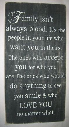 a sign that says family isn't always blood it's the people in your life who want you in their