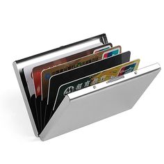 a metal wallet with credit cards in it