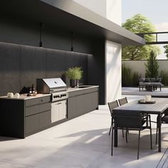 an outdoor kitchen and dining area is shown