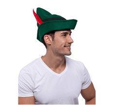 a man wearing a green elf hat with red and black horns on his head, looking to the side