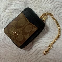 This Is A Brand New Coach Wallet. It Is Dark Brown With The Signature Coach Emblem On The Front. It Is Approximately 3x4 Inches. Coach Gold Wallet For Everyday Use, Coach Gold Wallets For Everyday Use, Gold Coach Wallet, Gold Rectangular Coach Coin Purse, Gold Wallet With Chain Strap, Coach Gold Wallet For Daily Use, Coach Gold Wallets For Daily Use, Gold Coach Wallets For Daily Use, Sequin Cards